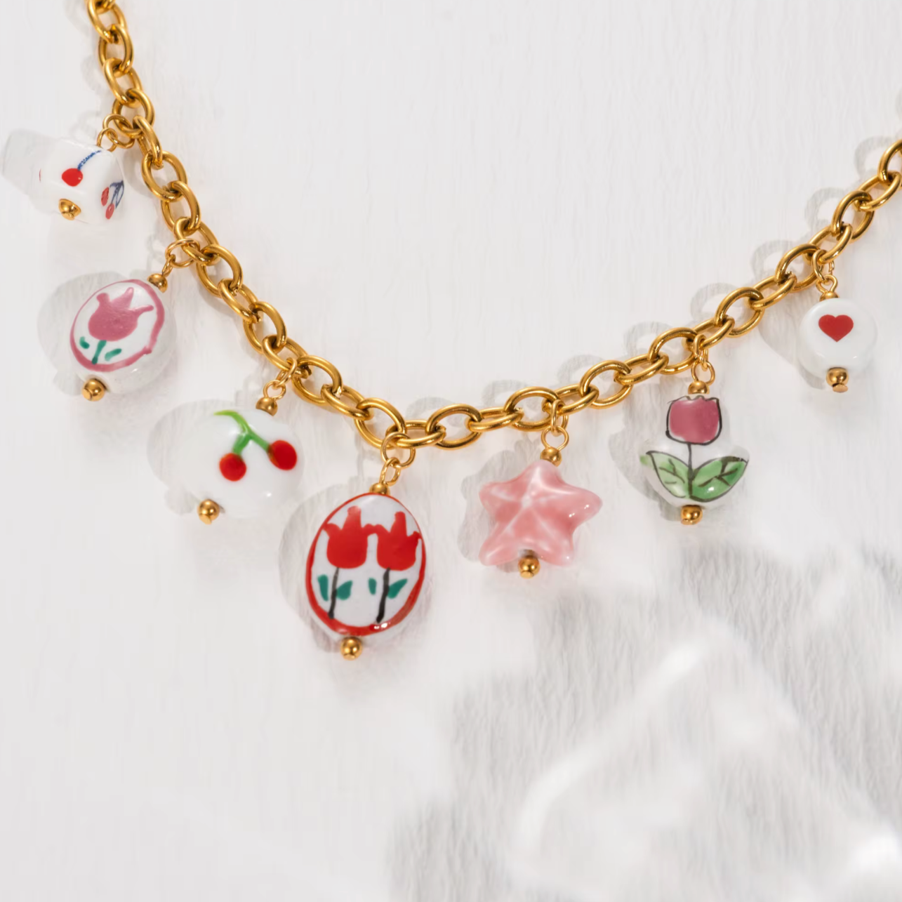 TUALI CHARM NECKLACE