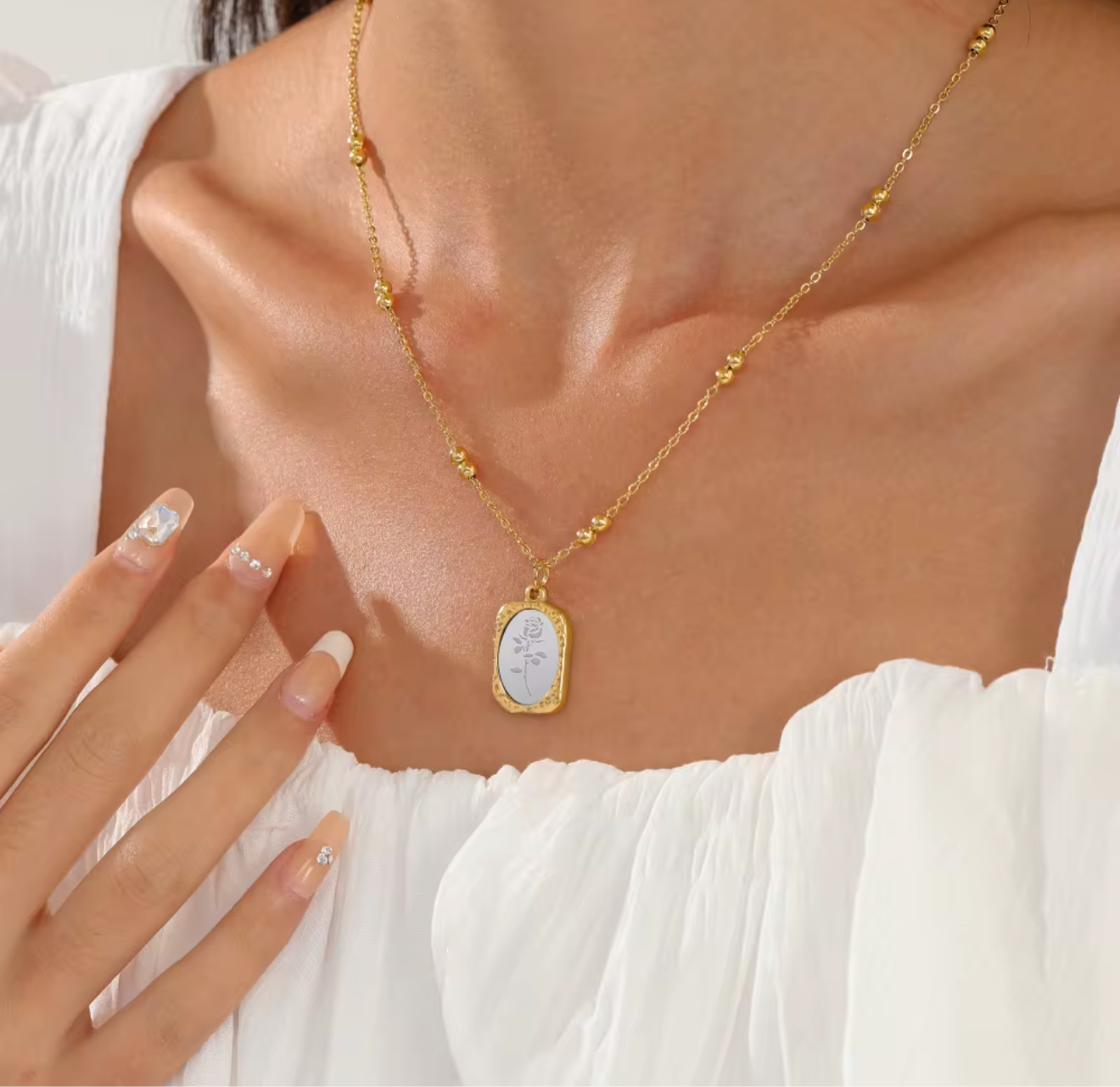 ROSE MEDALLION NECKLACE